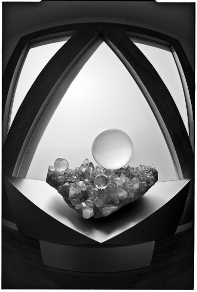 A crystal ball atop a bed of crystals